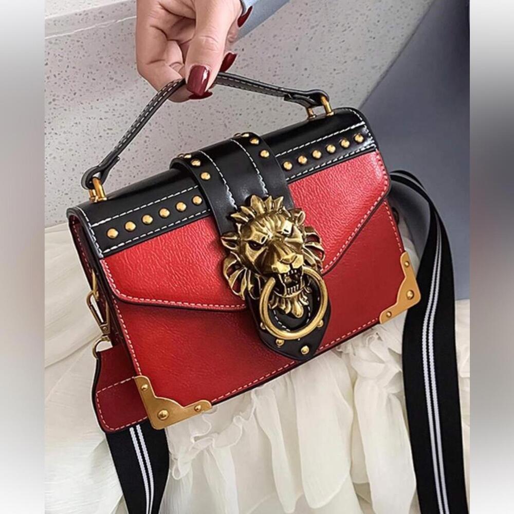 Stylish Red and Black Handbag with Gold Accents - Picture 3 of 6